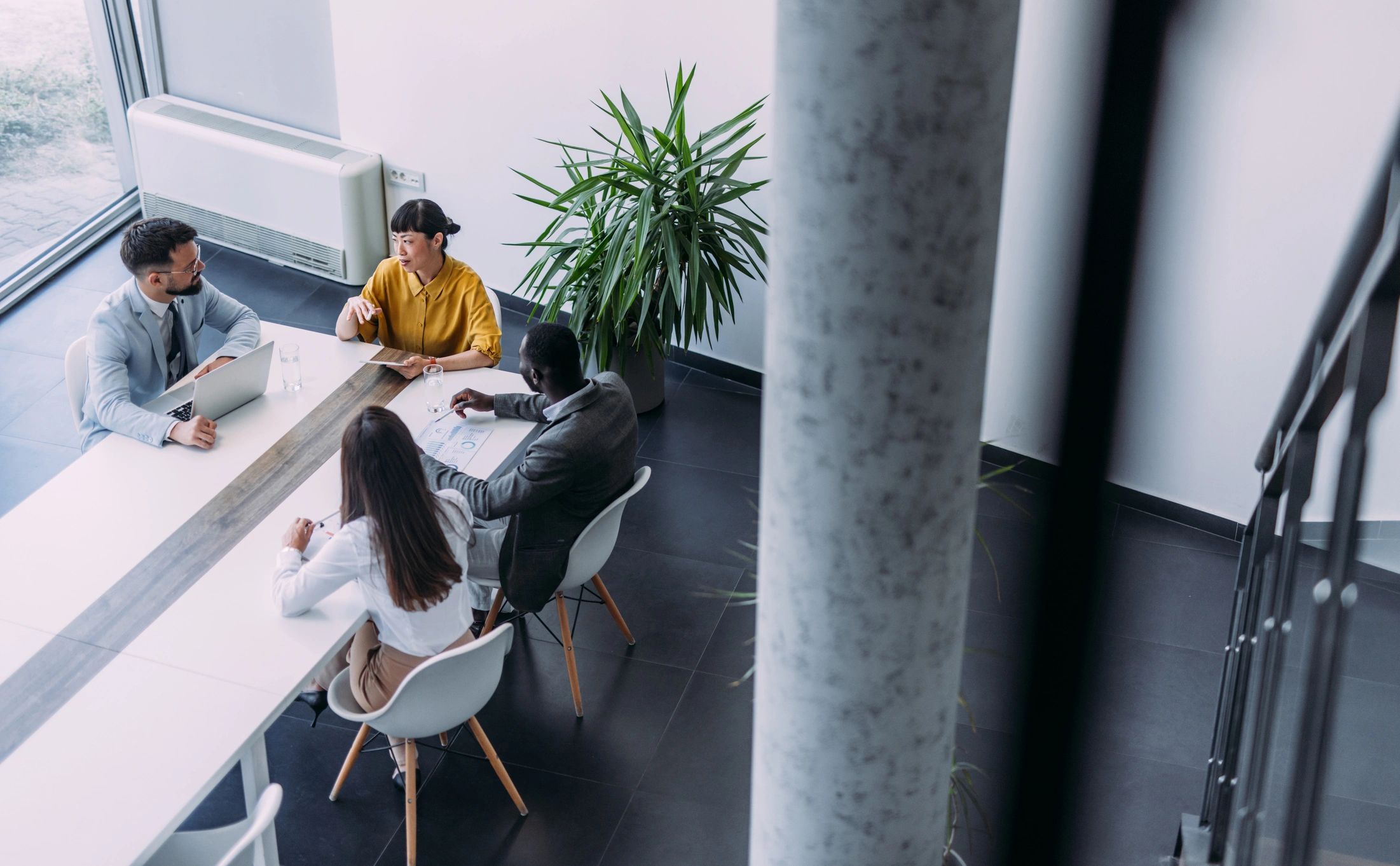 Business team meeting around a conference table